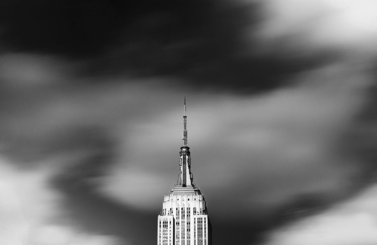 Empire State Building with passing clouds