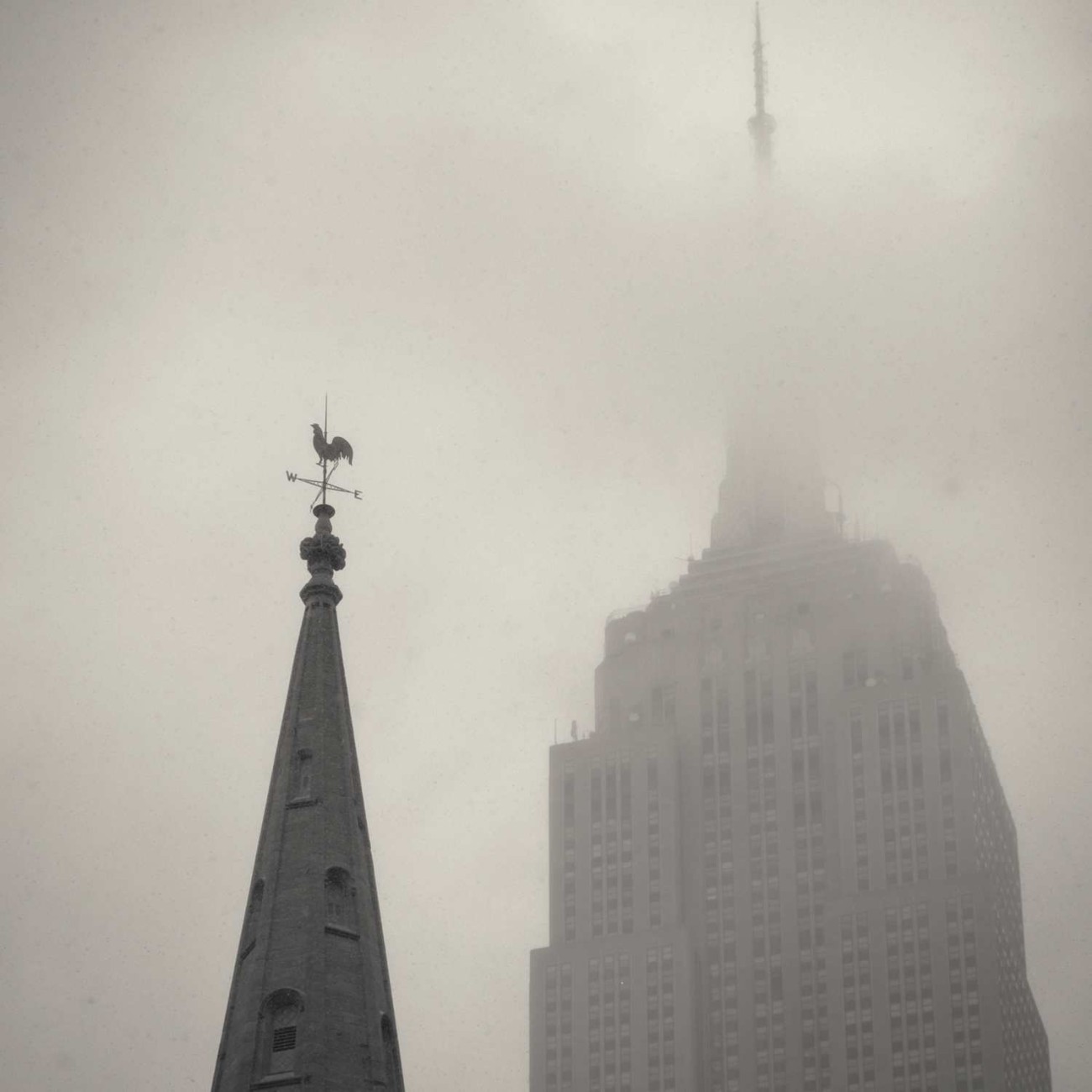 Empire State Building and steeple in fog, NY, 2014