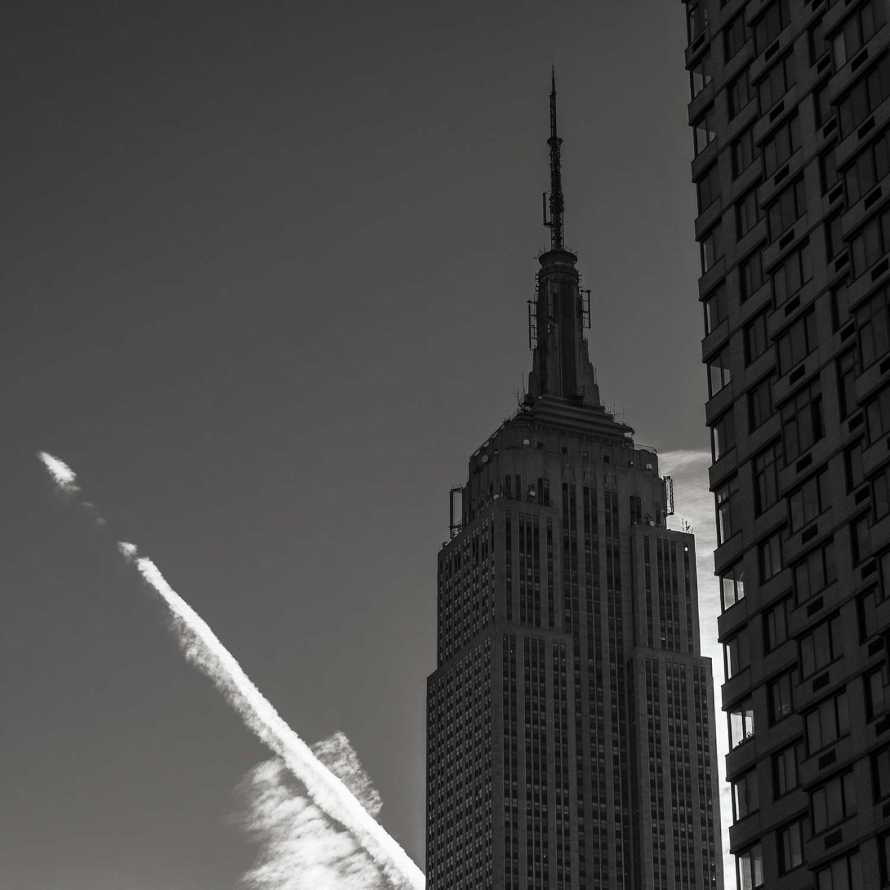 Empire State Building and contrail, New York, 2014